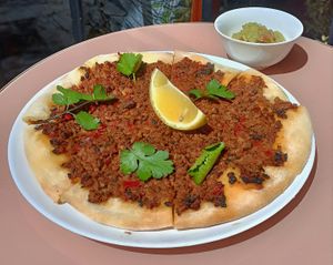 Lahmajo: soy mince, flatbread, bell pepper, mixed herbs, kimchi paste, guacamole at Kruzhok in Yerevan