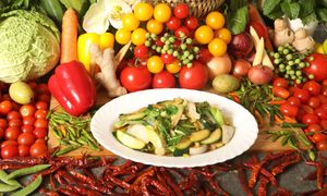 Mixed Green Veg Stir-Fry: A vibrant Thai dish showcasing a colourful medley of fresh green vegetables stir-fried to perfection. at Kats Oriental Cuisine in St Albans