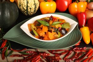 This comforting and flavourful Thai curry features tender chunks of pumpkin and a colourful assortment of mixed vegetables at Kats Oriental Cuisine in St Albans