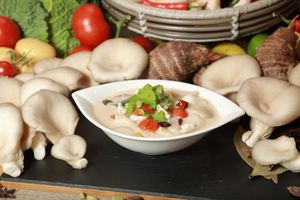 Tom Kha Soup: Light coconut cream soup flavoured with galangal, mushrooms lemongrass and lime leaves. at Kats Oriental Cuisine in St Albans