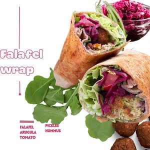 Falafel, arugula, tomato, pickles, hummus. at Sisu Kitchen %100 Vegan in Antalya