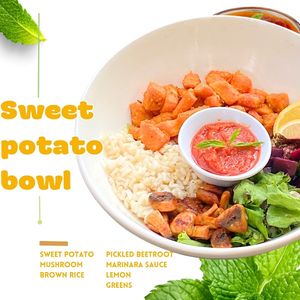 Sweet potato, mushrooms, brown rice, pickled beetroot, greens, lemon, marinara sauce. at Sisu Kitchen %100 Vegan in Antalya