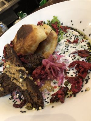 Nettle perogi spring main course at be love in Victoria