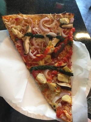 By the slice v for vegan pizza at Two Boots Nashville in Nashville