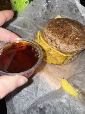 Breakfast slider! Belgium waffles, chickpea scramble, sausage, cheeze, and maple syrup!!   at Vegan Mami in Henderson