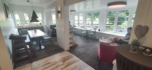 Einer der Sitzbereiche at Waldhuuske  in Rosengarten