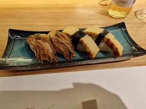 Enochi nigiri with wasabi and tofu "egg" nigiri at Shojin Sushi Minamo in Osaka