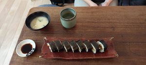 Miso soup, extra soy sauce, green tea and full roll at Shojin Sushi Minamo in Osaka