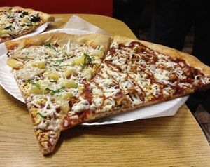 Vegan Hawaiian and T. Hanks slices. at Vinnie's Pizzeria in Brooklyn