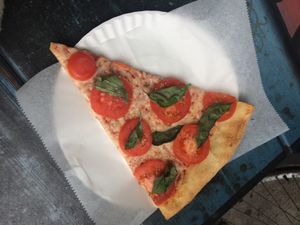 5 bucks for a slice  at Vinnie's Pizzeria in Brooklyn