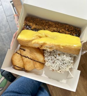 Yum yums and coconut bakewell   at Coughlans Bakery - Crawley in Crawley