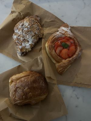Almond croissant, chocolate croissant, strawberry pastry   at The Milkman - Cockburn St in Edinburgh