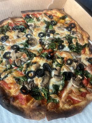 Vegan Cheese, Black Olives, Mushrooms and Spinach.   at Ozzy's Apizza - Food Stand in New Haven