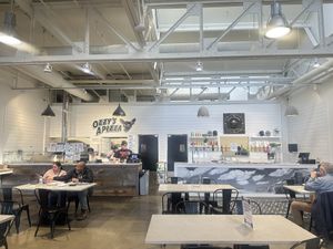 Counter service within market  at Ozzy's Apizza - Food Stand in New Haven