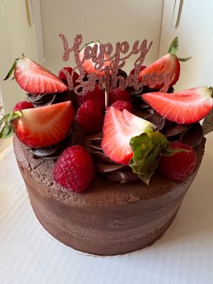 Chocolate cake with chocolate buttercream and fresh organic berries  at Sweets by Victoria - No Storefront in San Diego