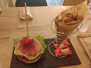 Vegan burger and potato wedges at O Sorriso in Porto Covo