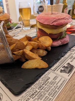 Vegan burger with beetroot bread and vegan cheese at O Sorriso in Porto Covo