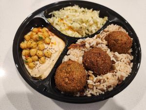 Falafel plate (falafels, cabbage salad, hummus, rice with lentils) at Dimassi's Mediterranean Buffet in Allen