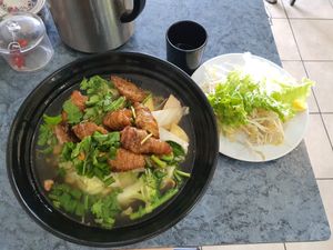 Stew soybean based pork intestine yellow noodle soup + green onion (extra $1) at World Vegan in Cabramatta