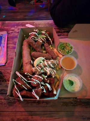 Munchies Box: fauxerella sticks, Tofish, chips, macho peas, curry and tartare dip, faggis, cauli wings and onion rings at Happy Fish at The Dog House in Edinburgh