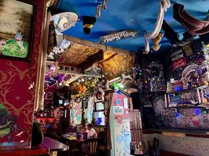 Eclectic decor of the pub   at Happy Fish at The Dog House in Edinburgh