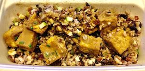 Peanut tofu sate with rainbow rice at Wandr in Dubai