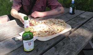 Flammkuchen with onion, vegan 'bacon' and vegan cream 'cheese' at Kaffeeklappe Oderbrück & Skiverleih in Andreasberg