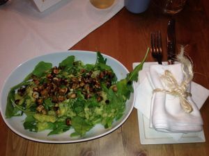 Green salad with almond tofu, nuts and avocado dressing (vegan) at Edelsberger in Baden