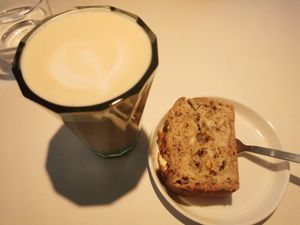 Latte and fluffy banana bread at Apoteka - Coffee & Plants in Tubingen