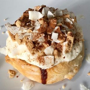 Coconut Cookie Roll - Vanilla frosting Graham Cracker Cookies, Coconut, and Cinnamon Sugar at Cinnaholic in Fort Wayne