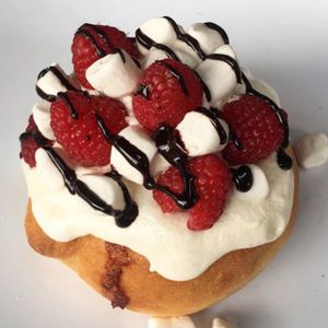 Marshmallow Frosting, Fresh Raspberries, Marshmallows & Chocolate Sauce!  at Cinnaholic in Fort Wayne