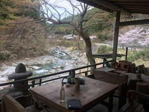 Breakfast can be served in the outdoor lounge with view on the Kurokawa river.  at Earth Hostel - Nikko Riverhouse in Nikko