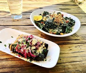 The Purple Taquitos (l) are so perfect and delicious. Kale Cesar salad (r) was too salty for my taste. at Seabirds Kitchen - The LAB in Costa Mesa