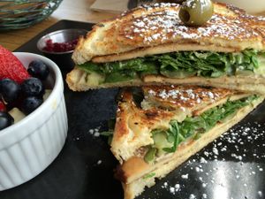 Porque Maria
smoked sliced tofu, cashew 'gruyere' cheese, rocket arugula, toasted sourdough, with powdered sugar and fresh fruit at Seabirds Kitchen - The LAB in Costa Mesa