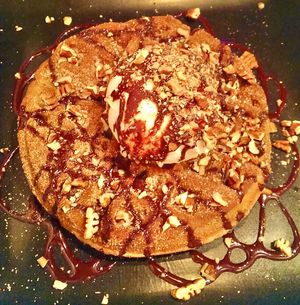 The Chaffle✨ Churro waffle topped w/ vanilla ice cream, chocolate sauce. Absolutely Delicious! at Seabirds Kitchen - The LAB in Costa Mesa