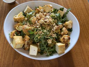 Warm Cauliflower salad with the tahini on the side and no chiles. Yummy!!! at Seabirds Kitchen - The LAB in Costa Mesa