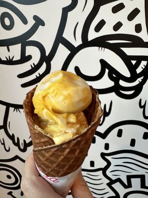 Mango sticky rice and pineapple POG in a waffle cone!  at Stella Jean's Ice Cream - The Lab in Costa Mesa