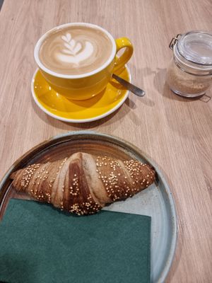 Vegan croissant & oatmilk latte at Zili's Health Bar in Budapest