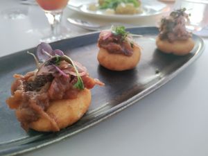 Arepas with eggplant on top at Elements Restaurant in Oranjestad