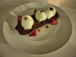 Carrot cake with almond-flavored ice cream. Best thing on the menu. at Elements Restaurant in Oranjestad