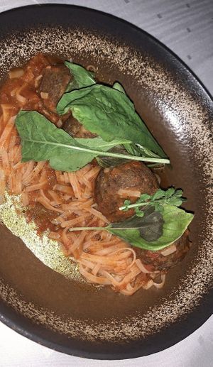 Healthy Italian Vegan Patties and Marinara Sauce over pasta. at Elements Restaurant in Oranjestad