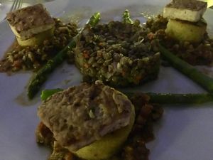 Polenta galettes, tofu, lentils, and asparagus  at Elements Restaurant in Oranjestad