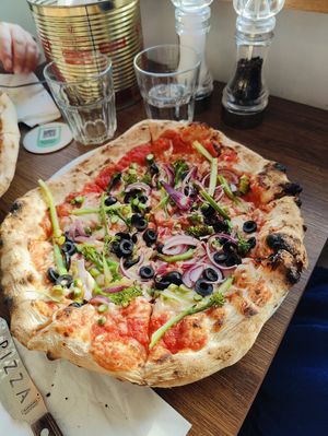 Veggies pizza with vegan cheese (olives, onion, asparagus, tenderstem) at Coastal Crust Pizza in Swanage
