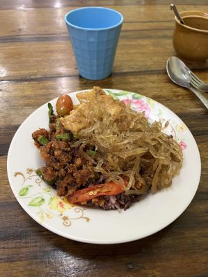 Larb, red curry tofu, and sweet fried noodles  at Veg Restaurant in Hua Hin