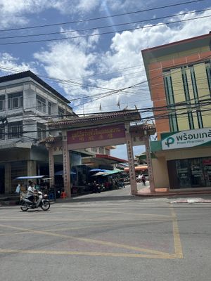 Enter the alley under this arch, go one block then turn left.  Restaurant is about 20 meters on the left  at Veg Restaurant in Hua Hin