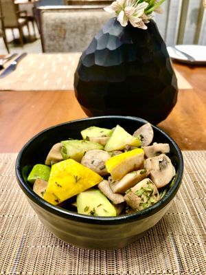 Sautéed mushrooms and courgette  at Cosmic Kitchen in Dubai