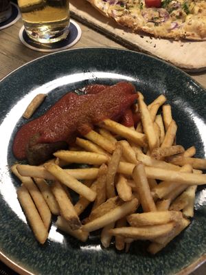 Curry wurst. Not the best that I ever tried but it was okay. Not very big portion  at Schwarzer Kater in Freiburg