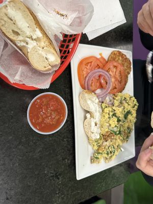 Eggless Omelet + tomatoes & Onions for the Everything bagel  at Bagel World in Poughkeepsie