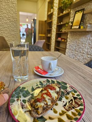 Grilled vegetables sandwich with vegan cheese on top at Kiskalácsom in Budapest