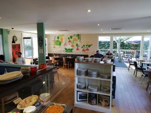 The inside seating area at La Faim Des Haricots in Blagnac